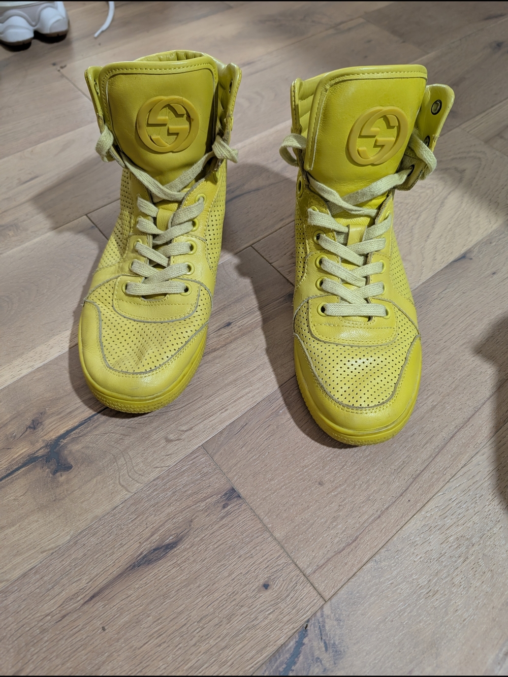 Gucci Yellow High-Top Sneakers with Raised Logo